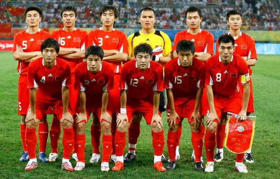 Members of the Chinese team pose before their men's first round Group C soccer match against Belgium at the Beijing 2008 Olympic Games